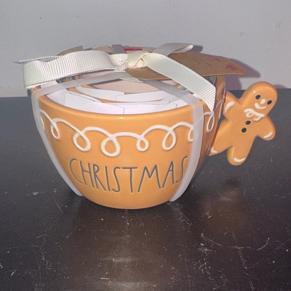 Rae Dunn Orange Christmas measuring cups with Gingerbread Man